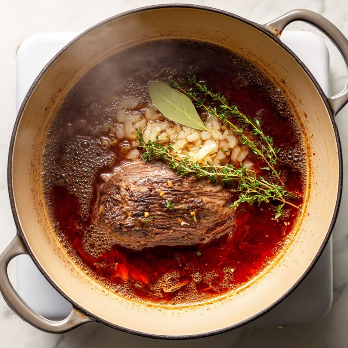 build the flavor base for pot roast recipe with onions, garlic, wine, and tomato paste