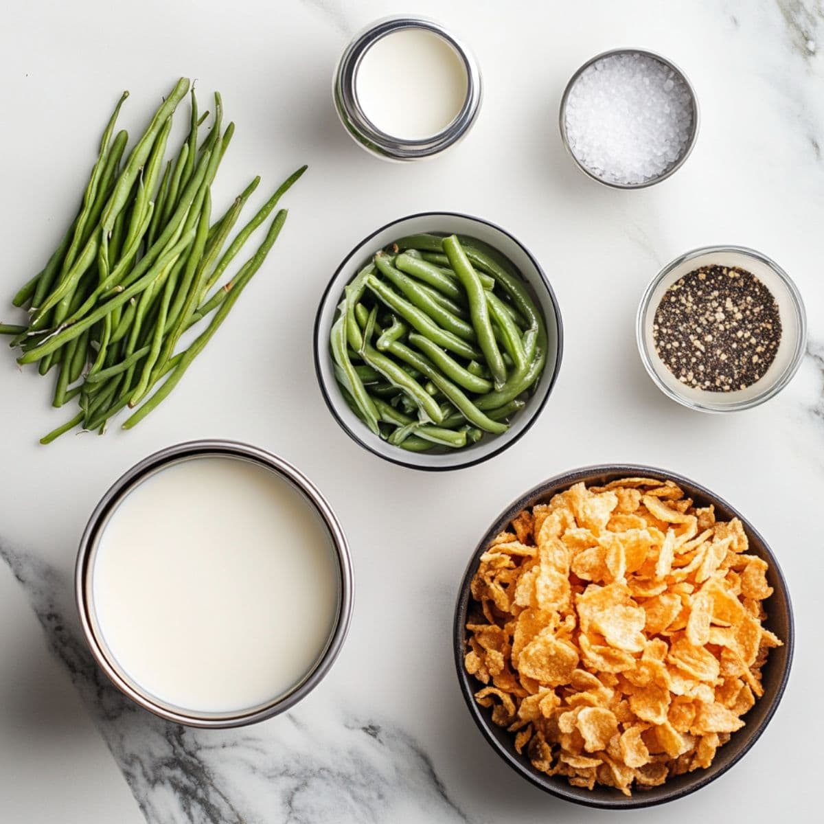 essential ingredients for green bean casserole recipe including green beans, mushroom soup,