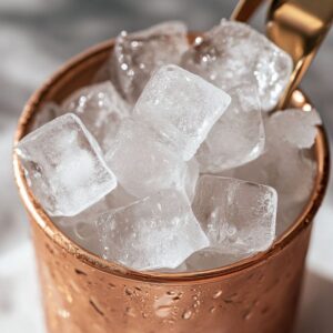 fill your mug with ice to start your kentucky mule recipe