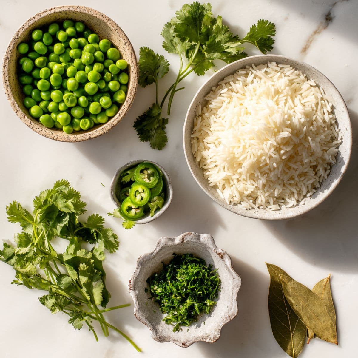 optional spanish rice ingredients like frozen peas, cilantro, jalapeño, and bay leaf