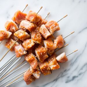 put chicken on skewers for ranch garlic parmesan chicken skewers