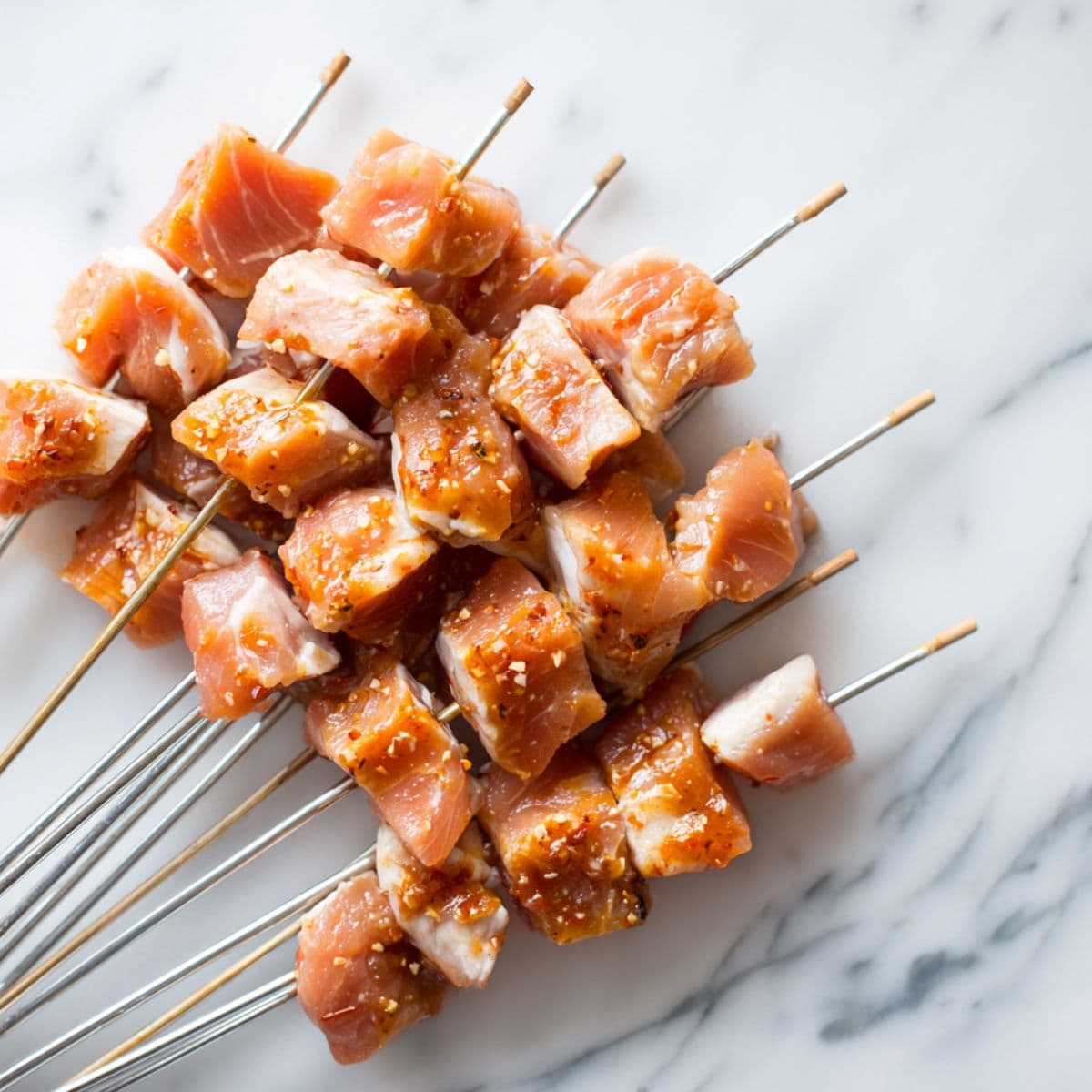 put chicken on skewers for ranch garlic parmesan chicken skewers