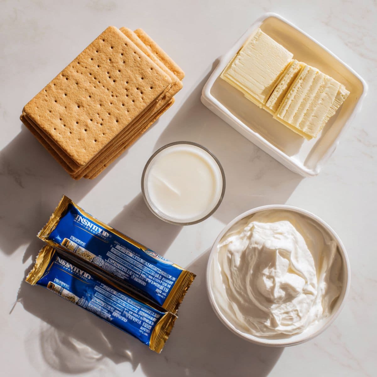 eclair cake ingredients on marble