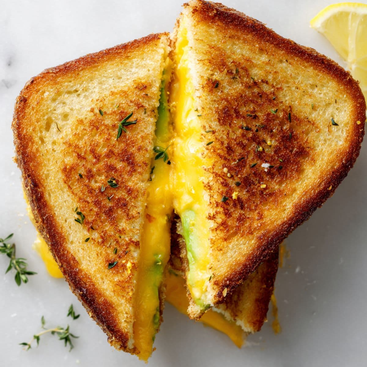 slicing avocado grilled cheese diagonally